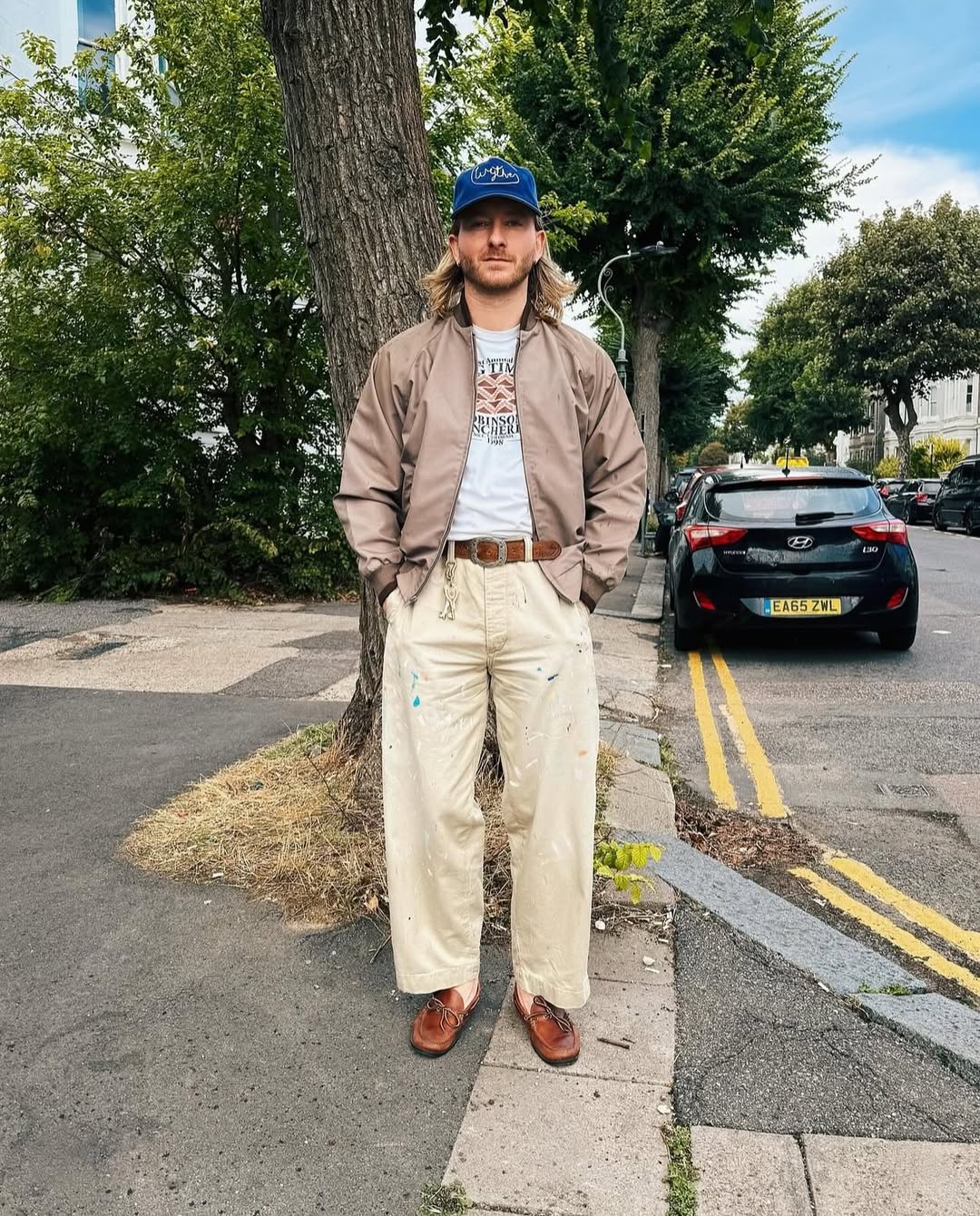 Tan Bomber Jacket & Cream Pants