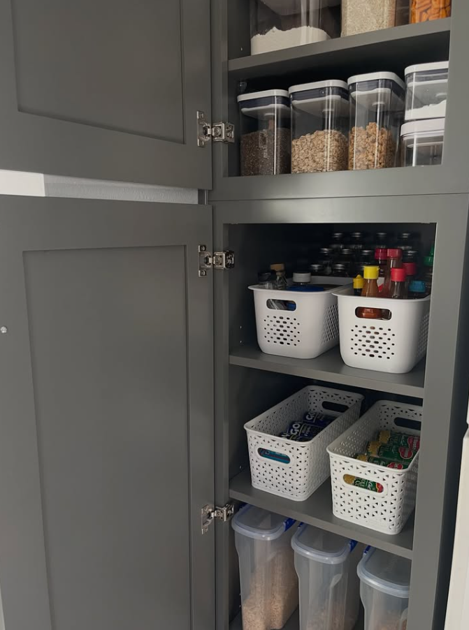 Sleek Gray Cabinet with Matching Containers