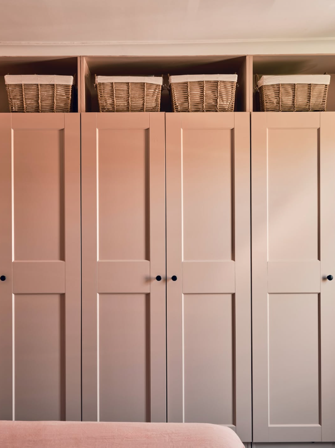 Soft Pink Built-In Wardrobe with Basket Storage
