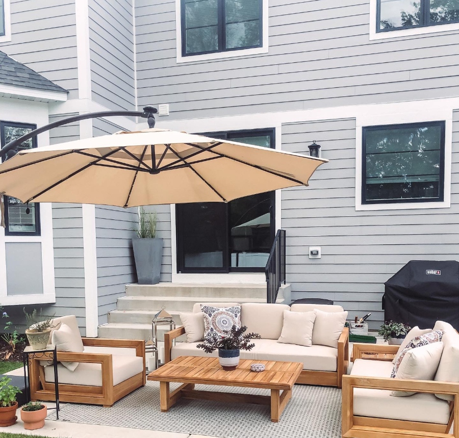 Clean Modern Patio with Natural Wood Furniture