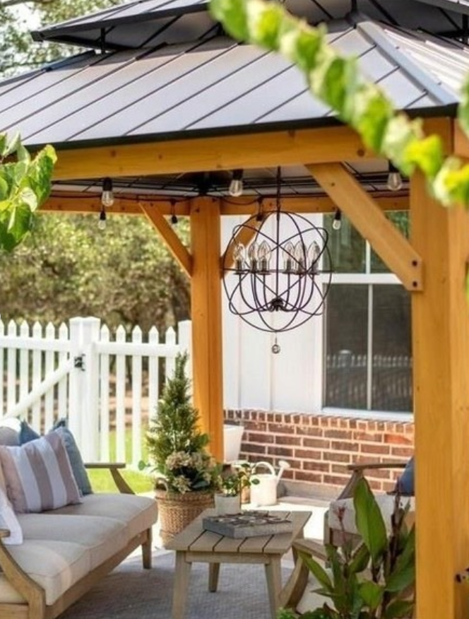 Elegant Covered Patio with Statement Lighting