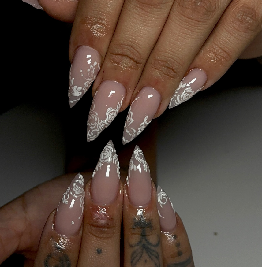 Intricate White Lace and Rose Design