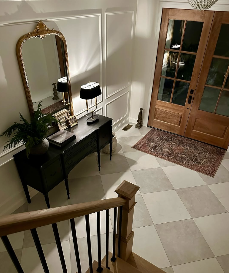 French-Inspired Entry with Gilded Mirror