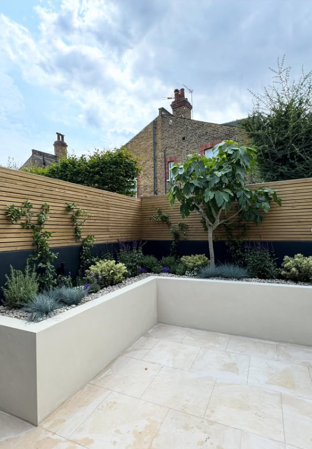 Raised White Render Bed with Timber Fence