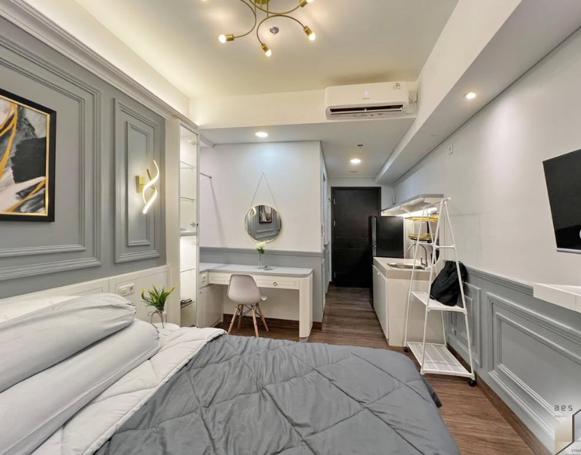 Gray Condo Studio with Vanity and Wainscoting