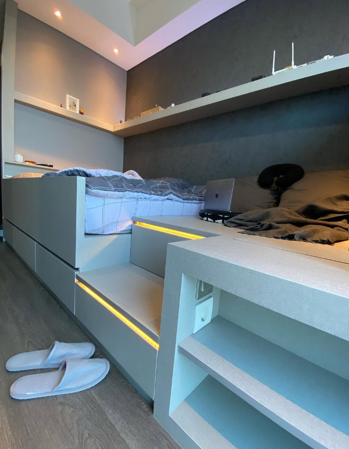 Compact Studio with LED Platform Bed and Built-In Shelves